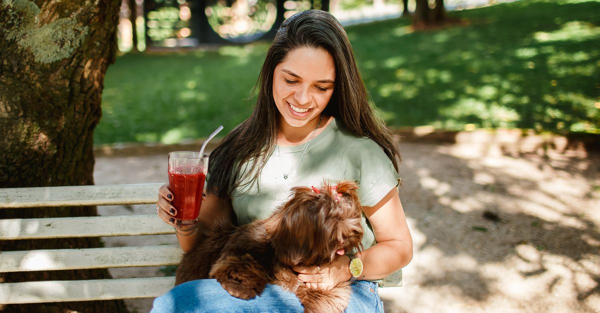 dog drinking outdoors